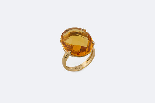 Anello in oro giallo con topazio