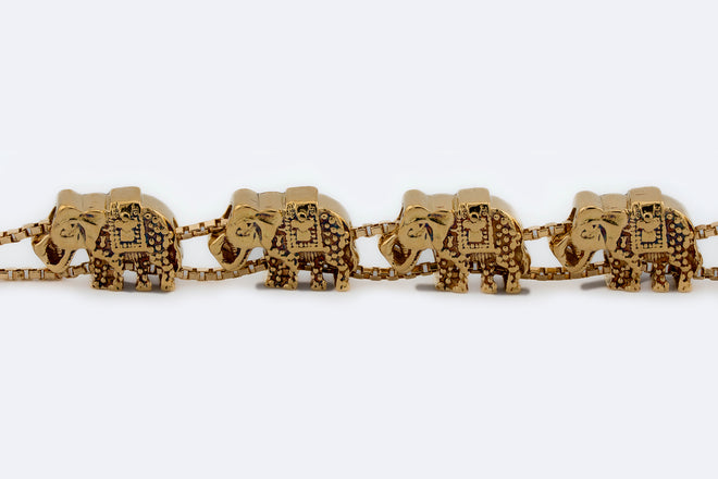 Bracciale in oro giallo con elefantini